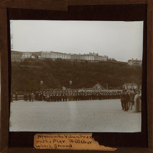 Ilfracombe Volunteers [...] on the Pier. Hillsborough in background