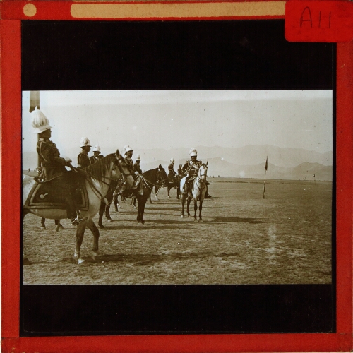 Group of important people parading on horseback