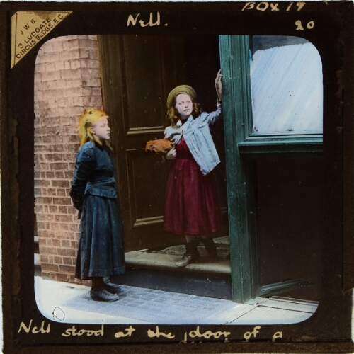 Nell stood at the door of a deserted shop