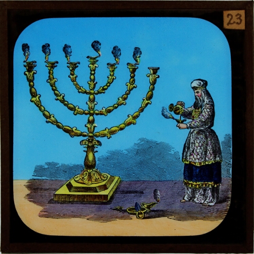 Priest lighting lamp of large menorah