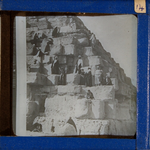 Group of people standing on Egyptian pyramid