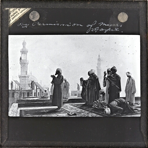 Muslim men praying on rooftop