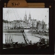 [Boats in harbour of unidentified town or city]