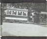 [Electric tram with trailer car in unidentified French-speaking city]