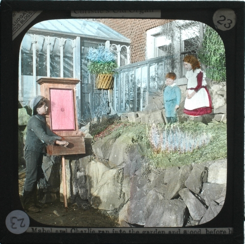 Mabel and Charlie ran into the garden and stood before him as he played– primary version