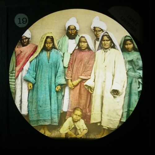 Slide showing group of Indian men and women