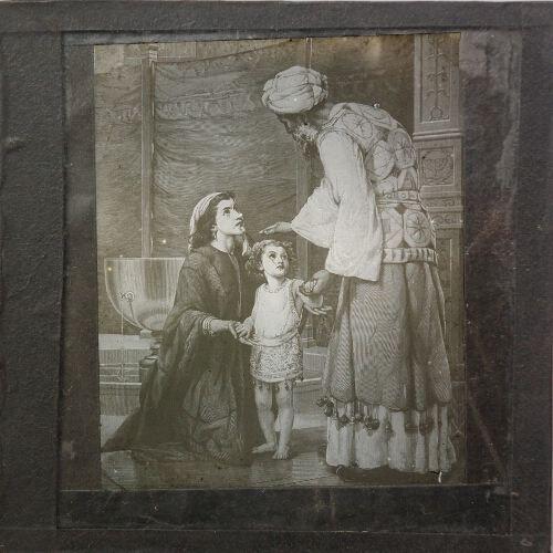 Woman, child and man in middle eastern costume