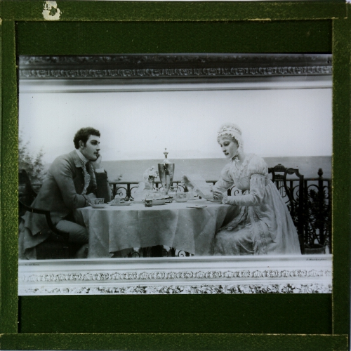 Man and woman sitting at table