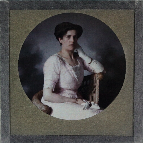 Portrait of woman sitting in chair