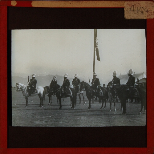 Group of military officers parading on horseback