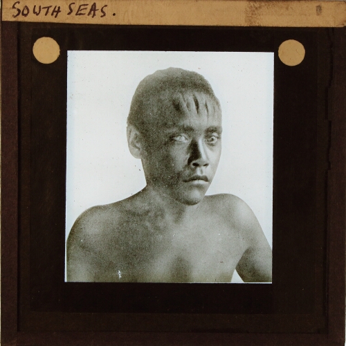 Native man with vertical scars on forehead