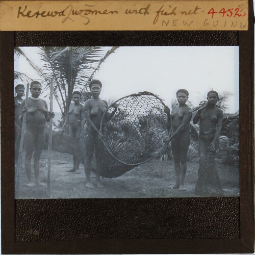 Kerewa women with fish net NEW GUINEA