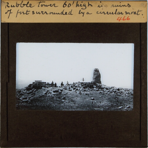 Rubble Tower 60' high in ruins of fort surrounded by a circular moat