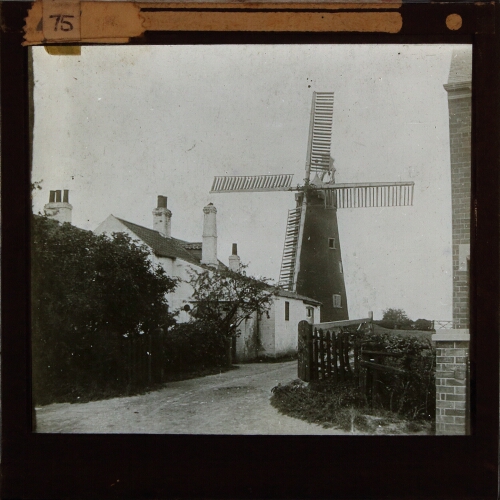 Windmill with surrounding buildings