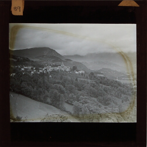 Distant view of village in mountainous landscape