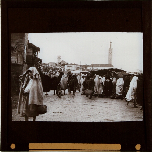 Street scene in Tangier with mosque in background