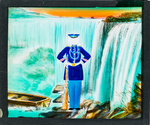 Soldier with waterfall in background