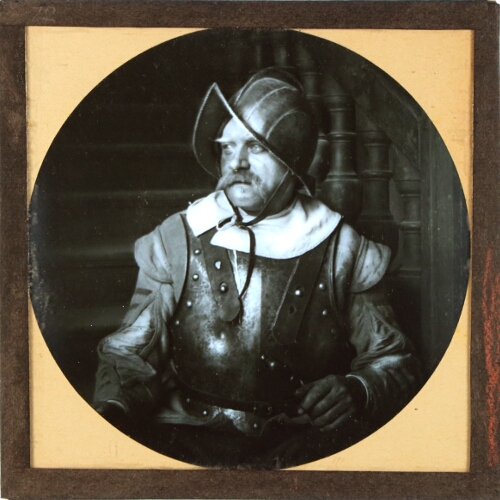 Portrait of unidentified man wearing armour and helmet