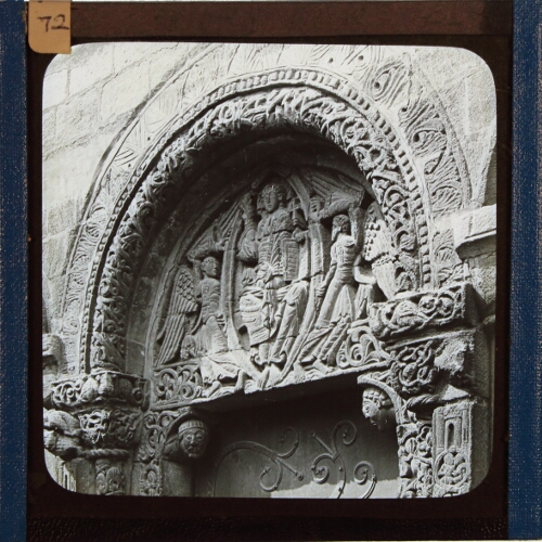 Carved stone tympanum of doorway of unidentified church