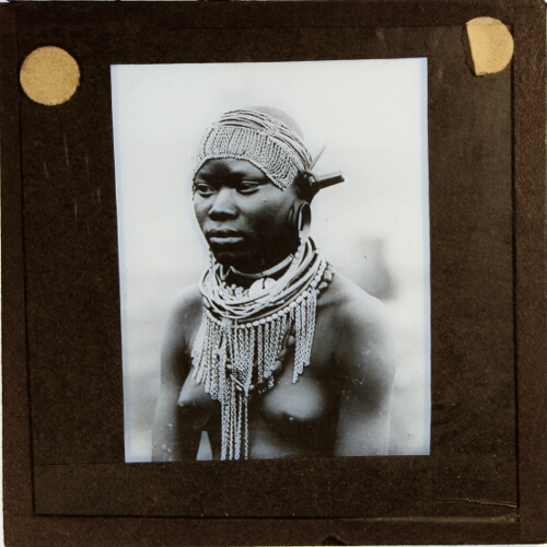 African woman with necklace and headdress