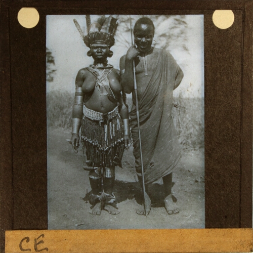 African man and woman with feathered headdress