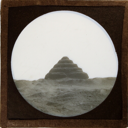 Stepped pyramid in desert landscape