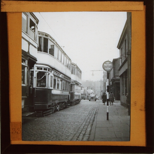 Trams parked in street in Manchester