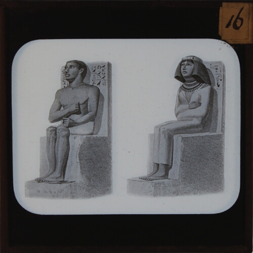 Statuettes of seated man and woman