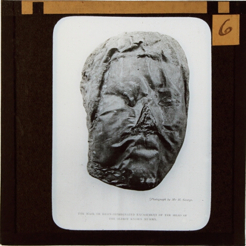 The mask or resin-impregnated encasement of the head of the oldest known mummy