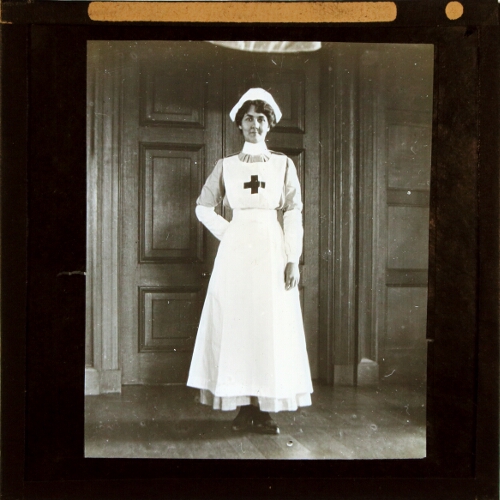 Nurse standing in hallway of Alderley Park