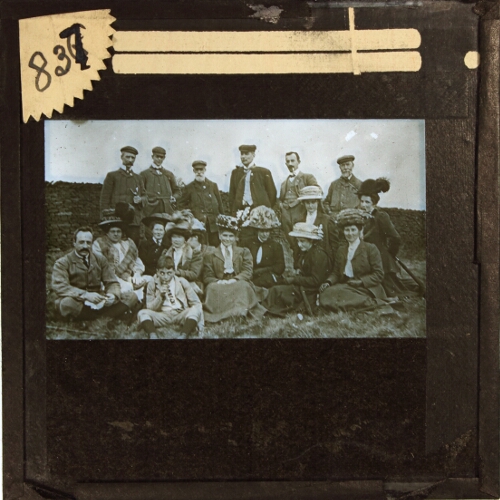 Group of people posing for photograph in rural location