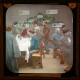 slide image -- It is Christmas Day in the Workhouse, and the cold bare walls are bright