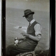 [A.H. Rousham holding puffin]