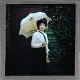 Portrait of woman with umbrella – Digital colour correction