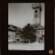 [Fountain and building with tower in unidentified town]