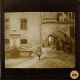 [Street with archways in unidentified town]