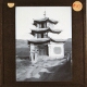 [Pagoda in hilly landscape]