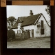 [Cottage with thatched roof]