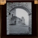 [Unidentified castle ruins seen through archway]