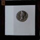 [Roman coin with head of Caesar]