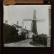 [Windmill with surrounding buildings]