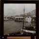 [Gibraltar naval dockyard with town in background]