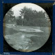 [Park landscape with well or pit]