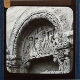 [Carved stone tympanum of doorway of unidentified church]