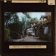 [Group of cottages with pump in courtyard]