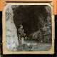 slide image -- Cefn Cave 1896 -- Mr Coward seated at entrance