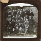 [Group of men and boys posing for photograph]