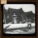 [Group of men moving large column at temple]