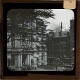 [Large buildings around square in unidentified city or town]