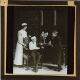 [Nurse with two schoolboys, one with injured arm and head]